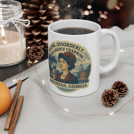 A mug featuring a woman in a hat beside a candle on a table, with the text Drunk Disorderly & Charming.