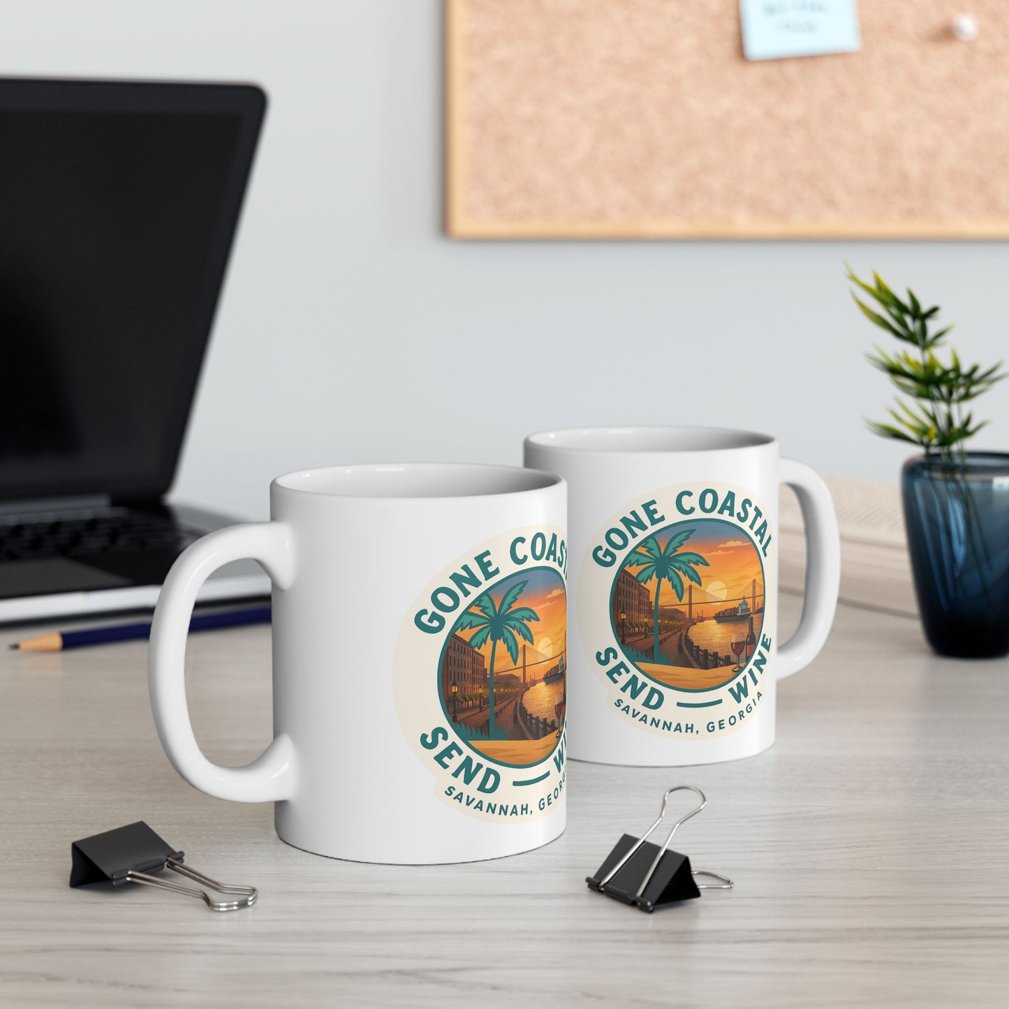 A ceramic mug printed with “Gone Coastal Send Wine – Savannah Georgia,” combining coastal charm with holiday cheer