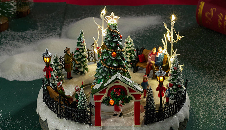 A festive Christmas tree illuminated with lights and adorned with decorations, symbolizing holiday cheer.