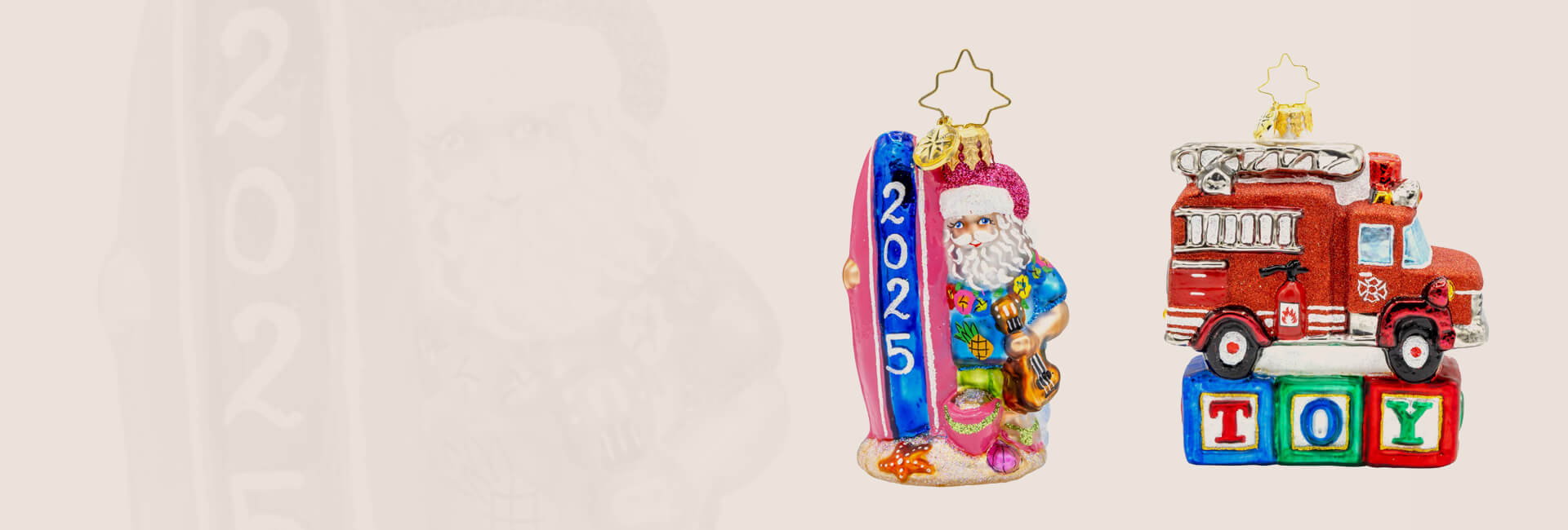 Two ornaments feature a fire truck and a toy, bringing a playful touch to Christmas decorations.