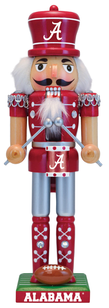 Wooden nutcracker figurine with Alabama logo on a white background